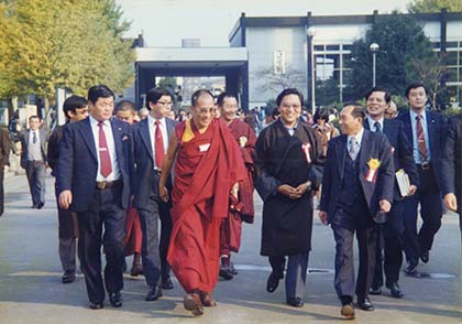 His Holiness the 14th Dalai Lama leaving the lecture hall
